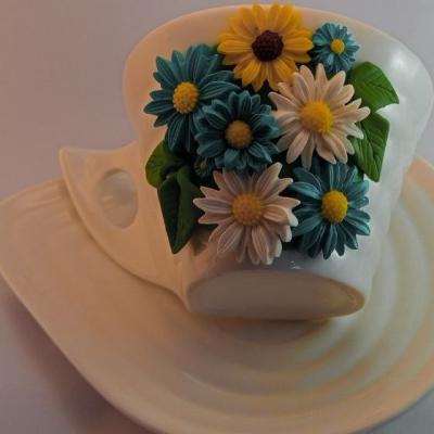 A Flowered Cup With Plate