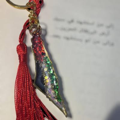 A Resin Key Chain Of Palestine Map Shape